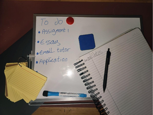 whiteboard and note pad to do list for the new semester
